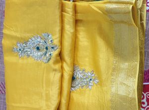 Elegent Yellow Saree With Tale Green Blouse