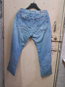 Ripped Blue Denim Jeans