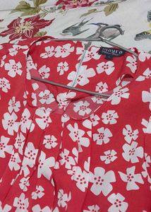 Red Top With Floral Design