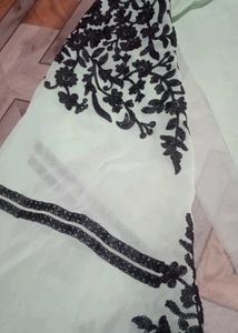 Elegant Embroidered unstitch material.