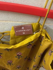 nishorama mustard noodle strap corset kurti