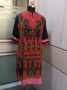 A colorful knee-length kurta