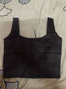 backless black blouse