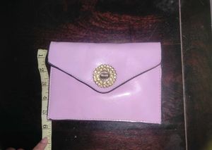 Sling Bag with Detachable Strap.