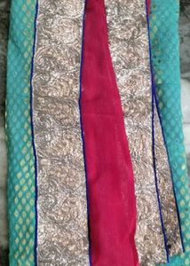 Red &amp;firoja colour saree.
