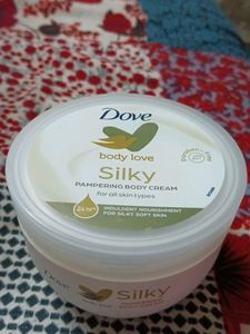 dove body love silky pampering body cream. unused. and new