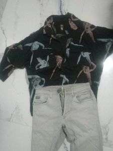 Gray Denim Jeans and a half shoulder shirt.