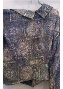 A multicolored top.