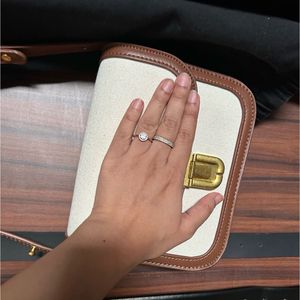 Off White Canvas Sling Bag