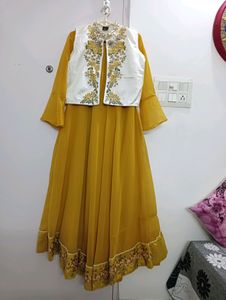 Embroidered yellow anarkali kurta with embroidered cream jacket