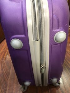 Purple Travelworld Rolling Suitcase