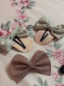 combo of hair bows and ear cuff