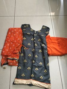 An Orange+Grey Suit