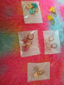 Cute butterfly earings and heavy clutch combo