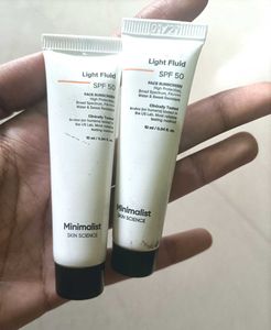 Minimalist Sunscreen And Serum.