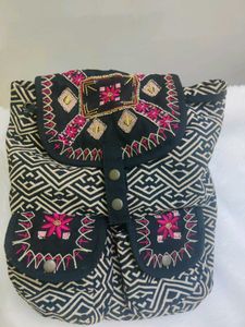 EMBROIDERED BACKPACK