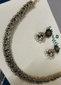 Black With Gold Neck Piece And Matching Jhumka