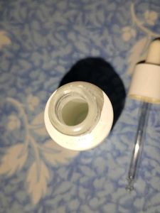 Empty Mamaearth Face Serum bottle
