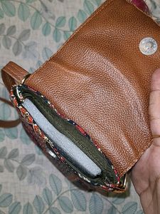 Vibrant Multicolored Sling Bag with Pink Tassels