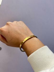 Gold Bangle Bracelet with Diamonds