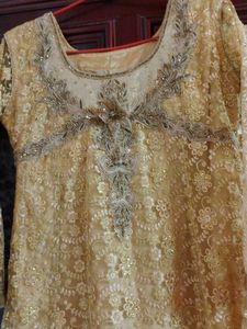 Royal Look Golden Colour Gown.