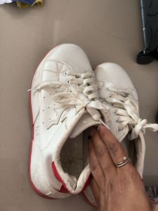 White Sneakers with Unique Design