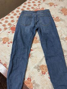 Ripped Knee Denim Jeans