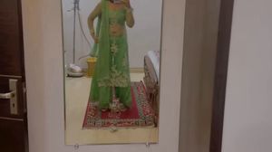 green shrara with long cap