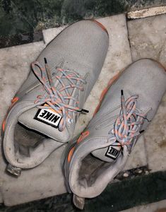 Boys Nike Grey And Orange Shoes