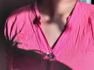 Pink Top with Unique Buttons
