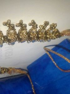 a golden colour necklace