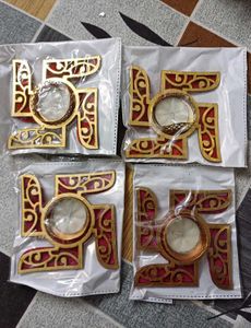 set of four diyas with swastik