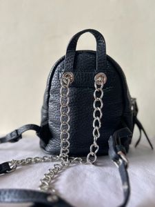 Mini Black Backpack with Chain Detail