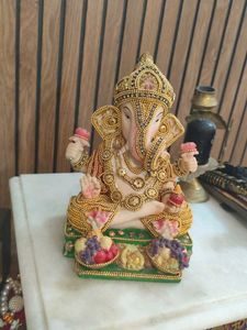 Ganesha Statue with Fruit Offerings