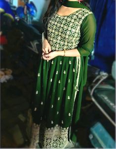 Naira Suit In Gorgeous Green Colour