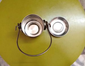 Combo of steel kadhai and milk container.