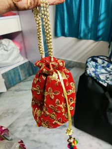 Red embroidery potli