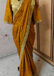 Elegant Mustard Saree with Gold Border