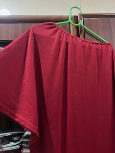 Red one shoulder dress with slit