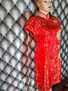 Cheongsam With Golden Thread Work On It