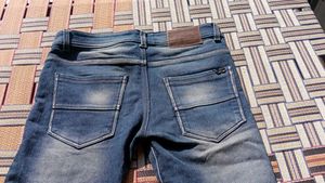 Distressed Denim Jeans