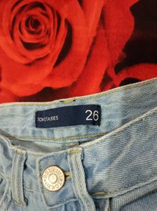 Ripped Jeans with Graffiti