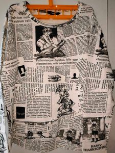 Viral Newspaper Print Pullover Top