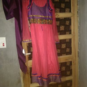 A Beautiful Shining Cloth Gajri Colour Frok Suit With Dupatta And Pajami For Size 36. A Second Hand Item But Purchasable No Damages