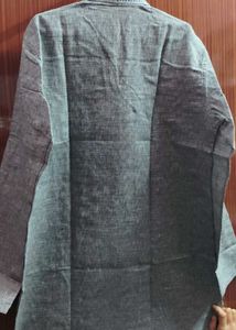 It is a grey Kurta.