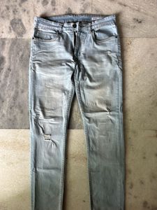 Distressed Denim Jeans