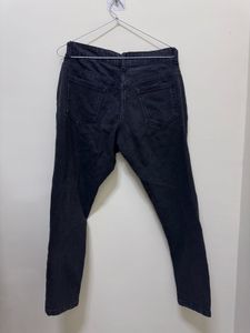 Distressed black jeans