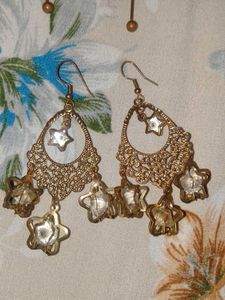 Set of 7 earrings and 1 necklace