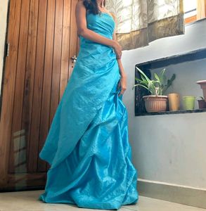 A Tube Party Wear Princess Gown With Heavy Flounce