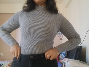 A Grey Turtleneck Top